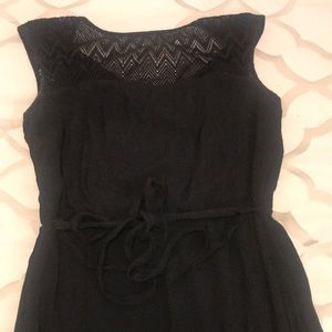 Luxology Black dress. Mesh shoulders w/ belt